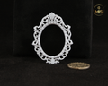 1:12th scale detailed miniature oval vintage ornamental baroque style painting/picture frame - Unpainted
